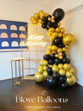 Melbourne birthday party decoration with gold and black color blove